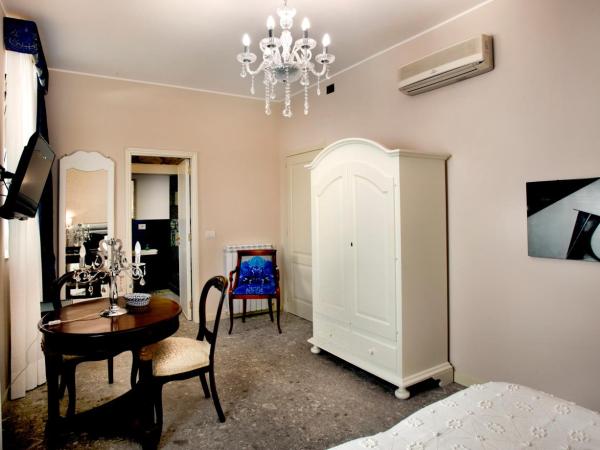 Porta Di Mezzo Luxury Suites & Rooms : photo 5 de la chambre grande chambre double 