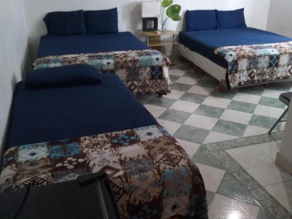 Yucatan Vista Inn : photo 1 de la chambre chambre triple avec salle de bains privative