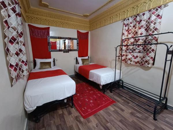 Be Nomad : photo 3 de la chambre chambre quadruple avec salle de bains commune