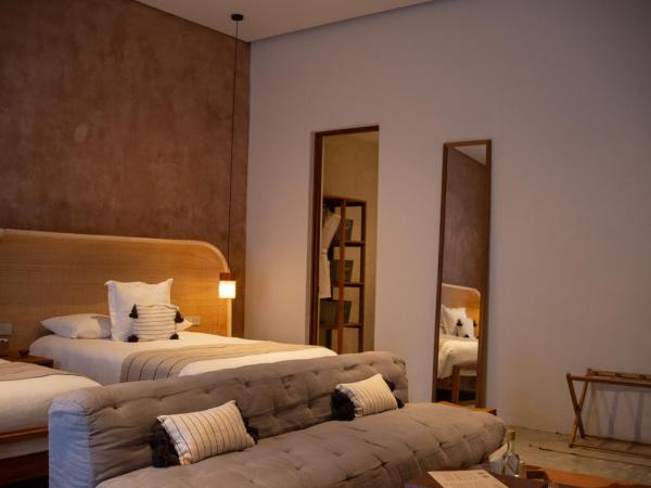 Casa Antonieta : photo 3 de la chambre suite disposant de 2 lits queen-size