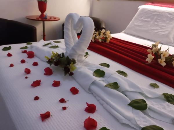 Pousada Flor de Ponta Negra : photo 5 de la chambre chambre triple classique