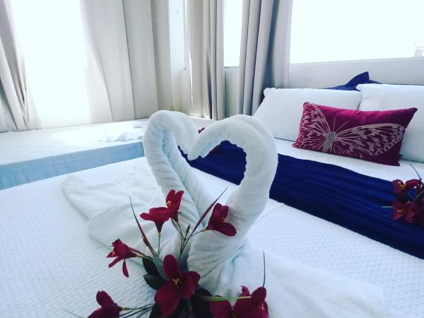 Pousada Flor de Ponta Negra : photo 6 de la chambre chambre quadruple - vue sur jardin