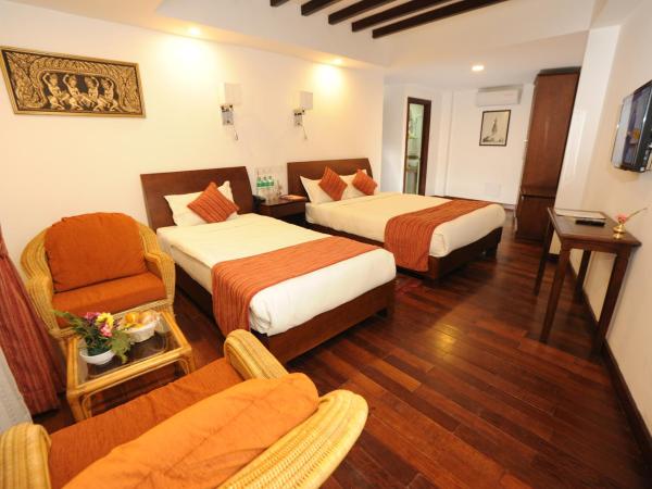 Apsara Boutique Hotel : photo 9 de la chambre chambre triple deluxe avec vue sur jardin