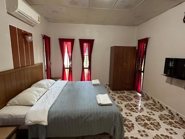 Fine Times Resort : photo 1 de la chambre chambre quadruple avec terrasse 