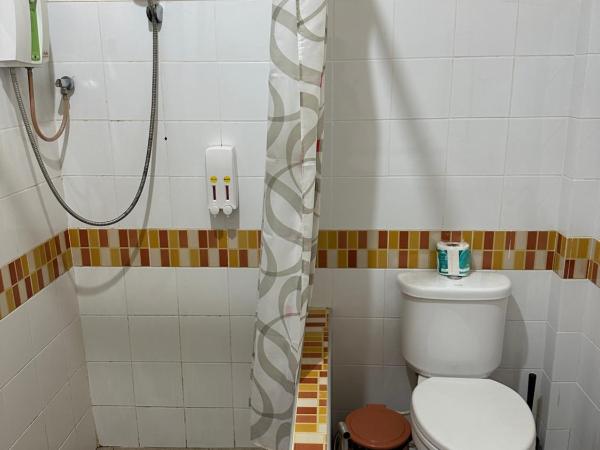 Fine Times Resort : photo 2 de la chambre chambre quadruple avec terrasse