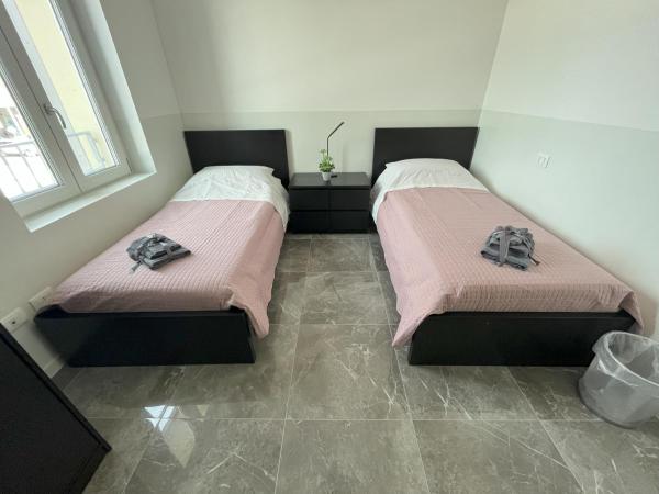 Welcome Milano Guest House : photo 6 de la chambre chambre lits jumeaux avec salle de bains commune