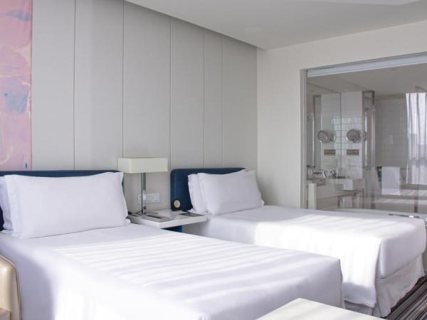 Grand Mercure Shanghai Century Park - Free shuttle bus to SNIEC : photo 1 de la chambre chambre lits jumeaux supérieure