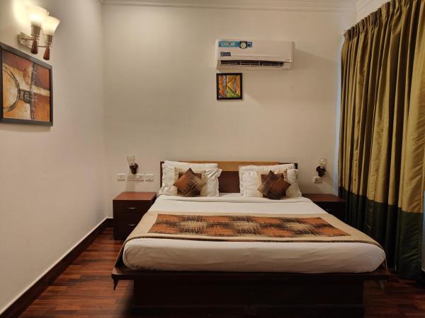 Tavisha Villa : photo 3 de la chambre chambre deluxe double ou lits jumeaux