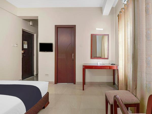 Church's Inn Near Cubbon Park : photo 6 de la chambre chambre triple classique