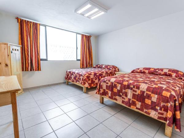 Cinco de Mayo Hotel : photo 1 de la chambre chambre deluxe avec 2 lits doubles