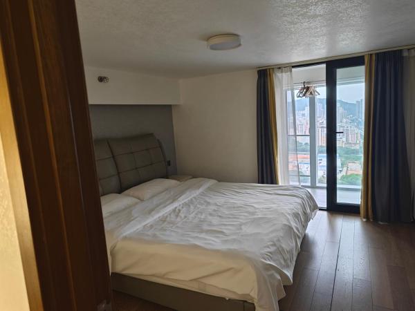 Xinghe Times Apartment - Shenzhen North Railway Station : photo 6 de la chambre suite familiale