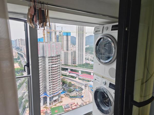 Xinghe Times Apartment - Shenzhen North Railway Station : photo 9 de la chambre suite familiale