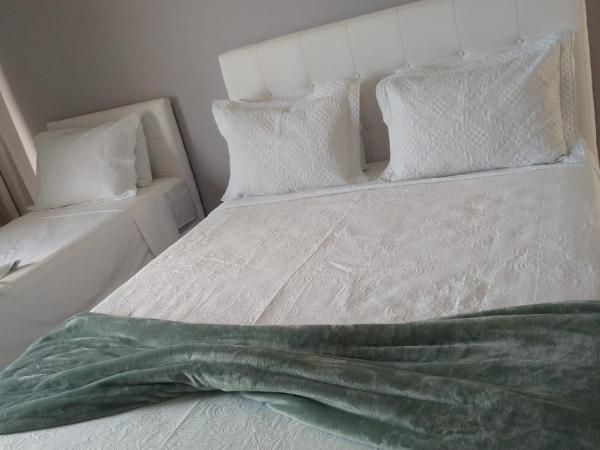 Pousada Sweet Home : photo 4 de la chambre chambre triple