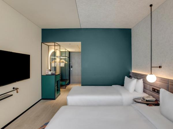 Novotel Pune Viman Nagar Road : photo 2 de la chambre premier twin room with complimentary imfl from 6:00 pm to 8 pm at barcode and shared airport transfer