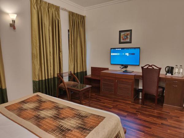 Tavisha Villa : photo 3 de la chambre chambre double ou lits jumeaux supérieure