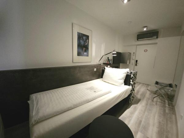 Hotel Amadeus : photo 4 de la chambre petite chambre simple