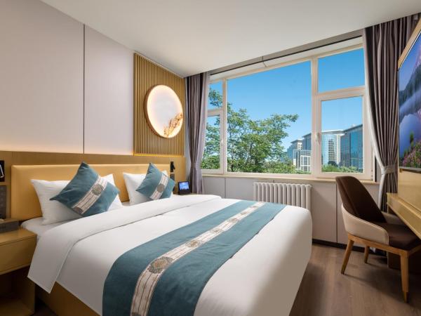 East Sacred Hotel - very close to the Drum tower And Nanluoguxiang Houhai Bar Very close to the bird's nest water cube : photo 4 de la chambre chambre lit queen-size deluxe