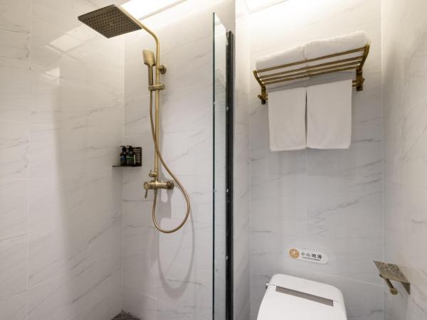 East Sacred Hotel - very close to the Drum tower And Nanluoguxiang Houhai Bar Very close to the bird's nest water cube : photo 10 de la chambre chambre lit queen-size deluxe