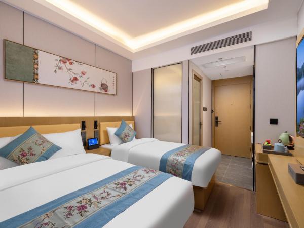 East Sacred Hotel - very close to the Drum tower And Nanluoguxiang Houhai Bar Very close to the bird's nest water cube : photo 6 de la chambre chambre familiale deluxe