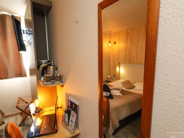 Hotel Restaurant Kyriad Brive Centre : photo 2 de la chambre hébergement 1 lit simple