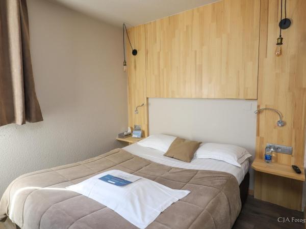 Hotel Restaurant Kyriad Brive Centre : photo 1 de la chambre hébergement 1 lit simple