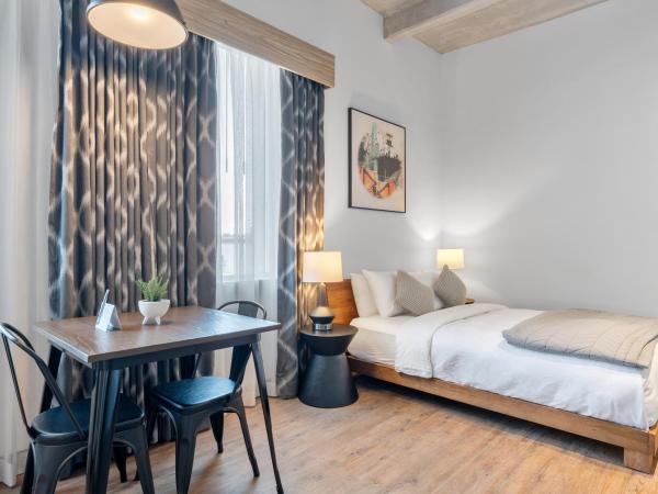 Cannery Lofts Niagara : photo 1 de la chambre studio lit queen-size