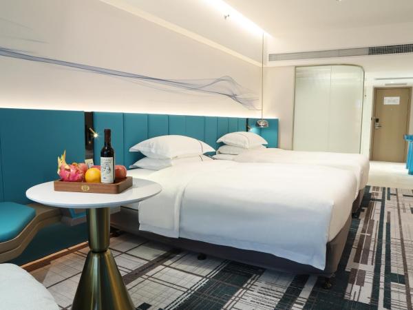 Asia International Hotel Guangdong : photo 2 de la chambre chambre lits jumeaux Élite