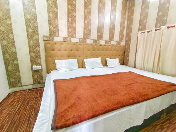 Hotel India inn : photo 1 de la chambre chambre triple avec salle de bains privative