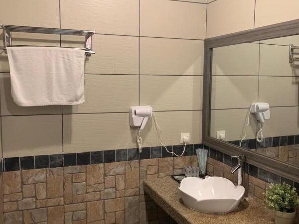 I Garden Hotel : photo 5 de la chambre chambre familiale - vue sur jardin