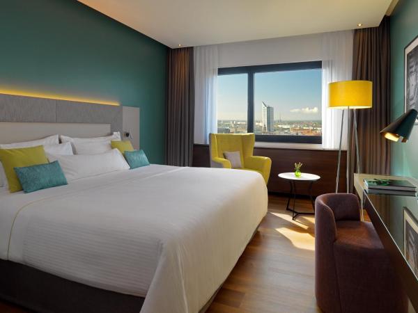 The Westin Leipzig : photo 1 de la chambre grande chambre lit king-size deluxe - Étage supérieur - vue sur ville