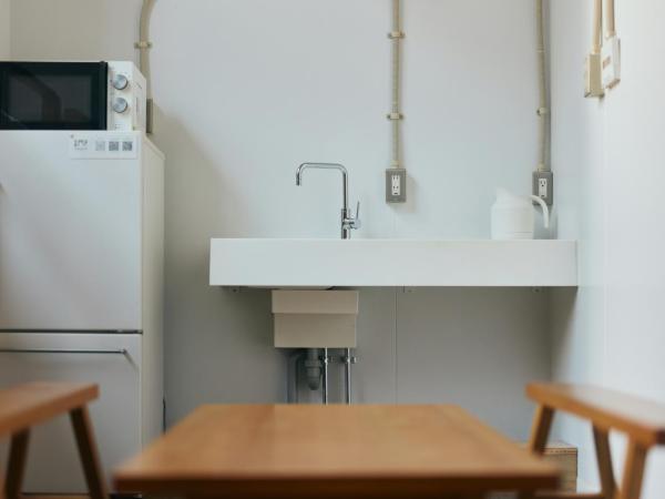 Common de - Hostel & Bar : photo 4 de la chambre chambre familiale supérieure