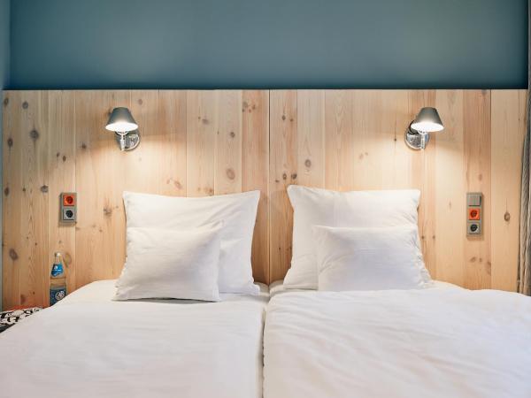 Villa Viva - ein Haus das Brunnen baut : photo 6 de la chambre chambre double standard