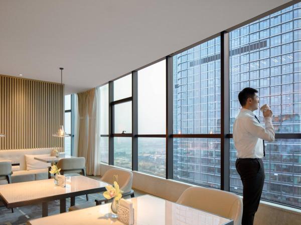 Chengdu Marriott Hotel Financial Centre : photo 4 de la chambre chambre lit king-size exécutive deluxe