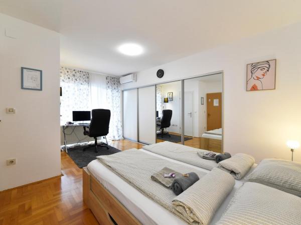 GreenHouse : photo 7 de la chambre chambre lit queen-size avec balcon