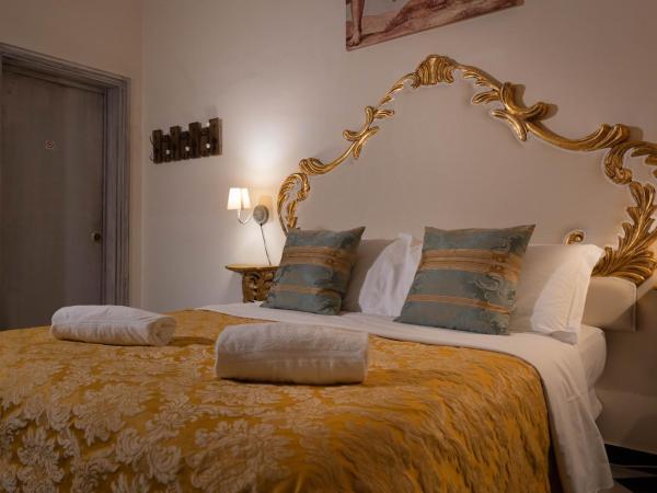 San Giorgio Rooms : photo 9 de la chambre chambre triple confort