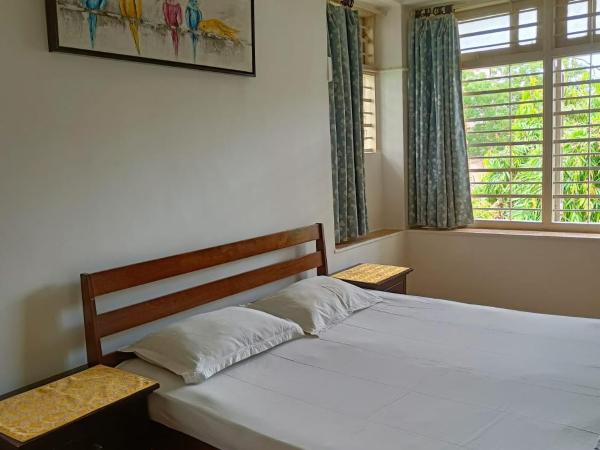 Srinekatan Heritage Villa Homestay : photo 7 de la chambre chambre double ou lits jumeaux deluxe avec balcon