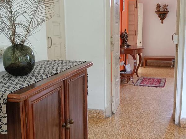 Srinekatan Heritage Villa Homestay : photo 4 de la chambre chambre double ou lits jumeaux deluxe avec balcon