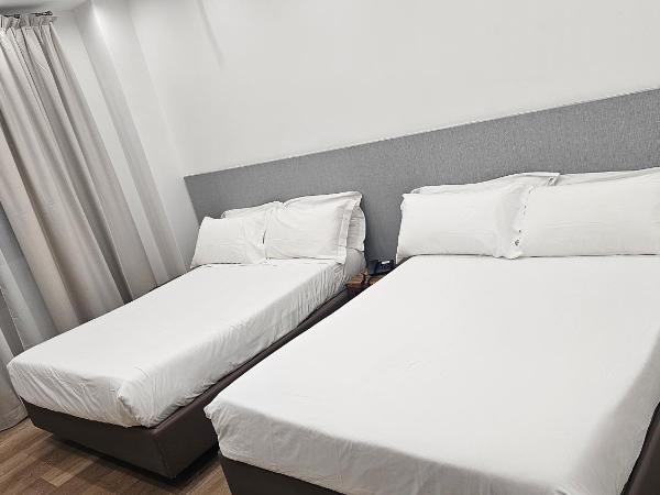 Hotel La Superba : photo 2 de la chambre chambre quadruple