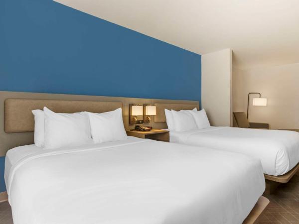 Comfort Suites Columbia Northeast - Fort Jackson : photo 1 de la chambre suite 2 lits queen-size - non-fumeurs