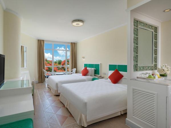 Sunshine Resort Intime Sanya : photo 2 de la chambre chambre double ou lits jumeaux - vue sur jardin