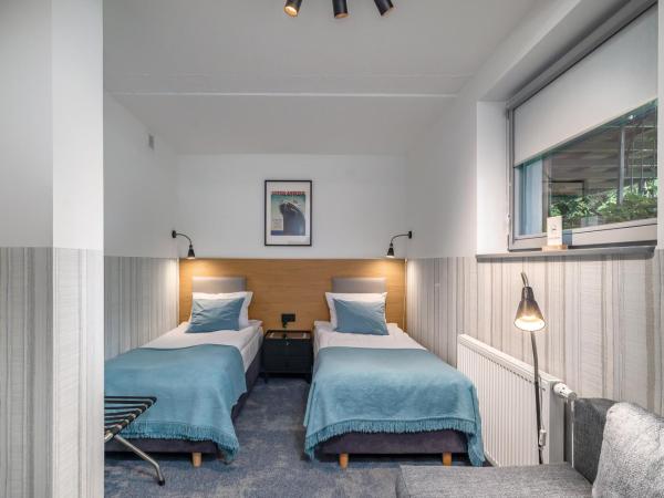 Grand Tulipan : photo 1 de la chambre chambre lits jumeaux avec lit d’appoint - 301