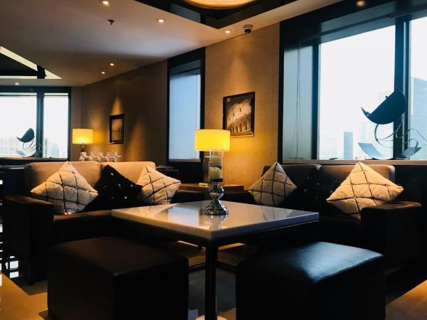 Courtyard By Marriott Shanghai Pudong : photo 1 de la chambre deluxe suite, executive level, suite, 1 king