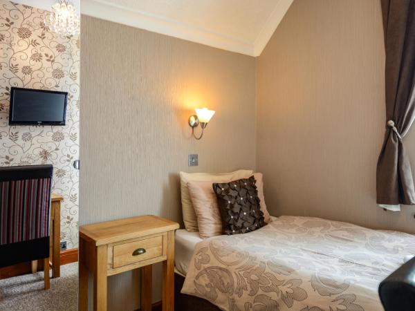 Tanes Hotel : photo 1 de la chambre chambre simple standard avec salle de bains commune