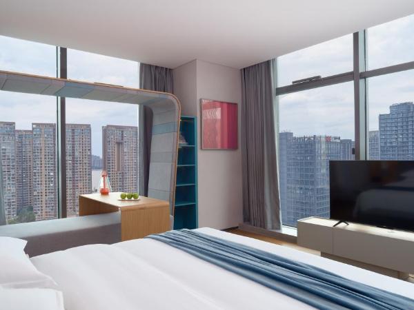 Pagoda Hotel Hangzhou Binjiang : photo 2 de la chambre chambre double exécutive - vue sur rivière