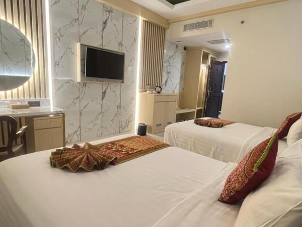 The Rich Jogja Hotel : photo 3 de la chambre chambre lits jumeaux deluxe - sans vue