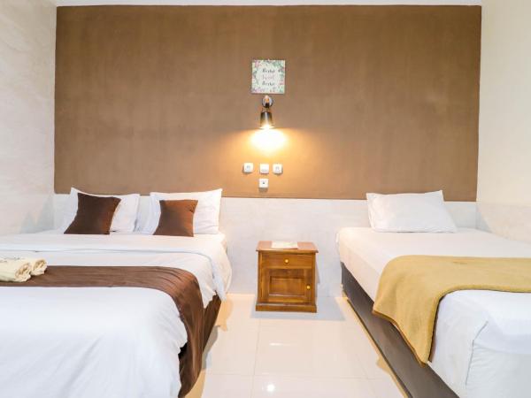 Hotel Safara Yogyakarta : photo 6 de la chambre chambre triple deluxe