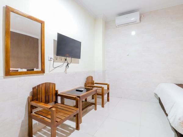 Hotel Safara Yogyakarta : photo 3 de la chambre chambre triple deluxe