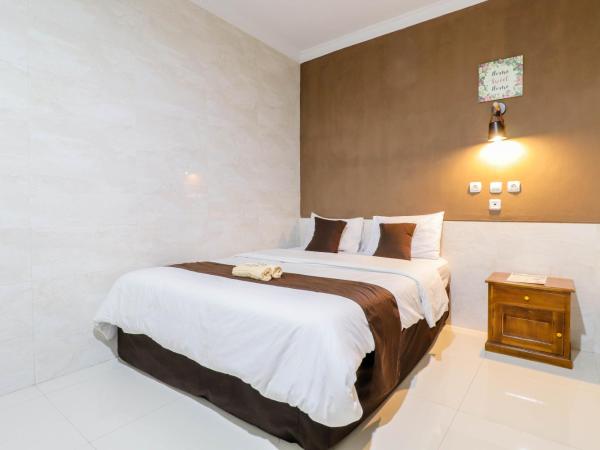 Hotel Safara Yogyakarta : photo 5 de la chambre chambre triple deluxe