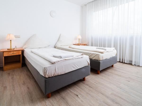 G & L Hotel Dortmund : photo 4 de la chambre chambre double ou lits jumeaux