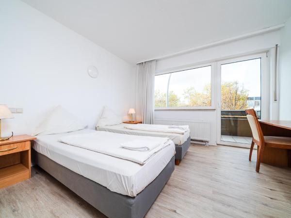 G & L Hotel Dortmund : photo 3 de la chambre chambre double ou lits jumeaux